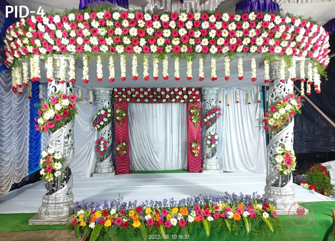 Grand wedding stage setup with floral columns - Design PID4